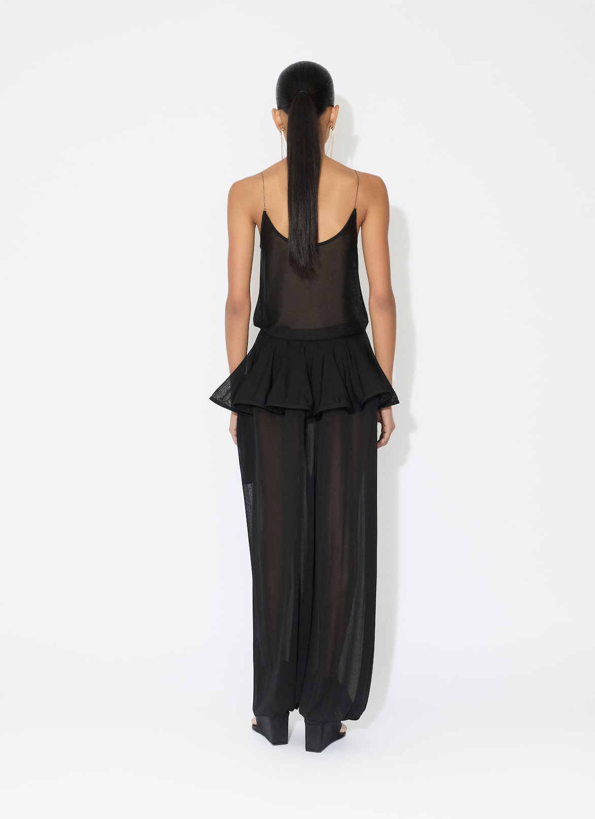 KNIT PEPLUM PANTS ALAÏA BLACK KNIT PEPLUM PANTS